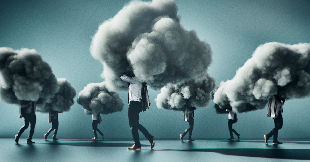 Business people walking around with their heads in individual clouds